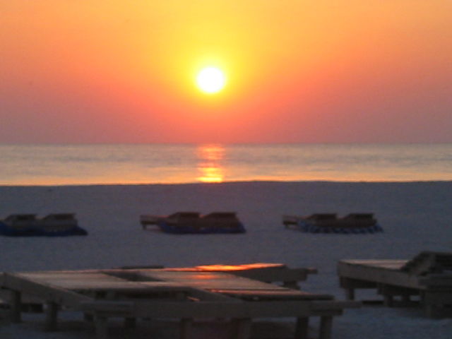 Takin in october of a beautiful sunset on st. pete beach. outside of the alden beach resort.