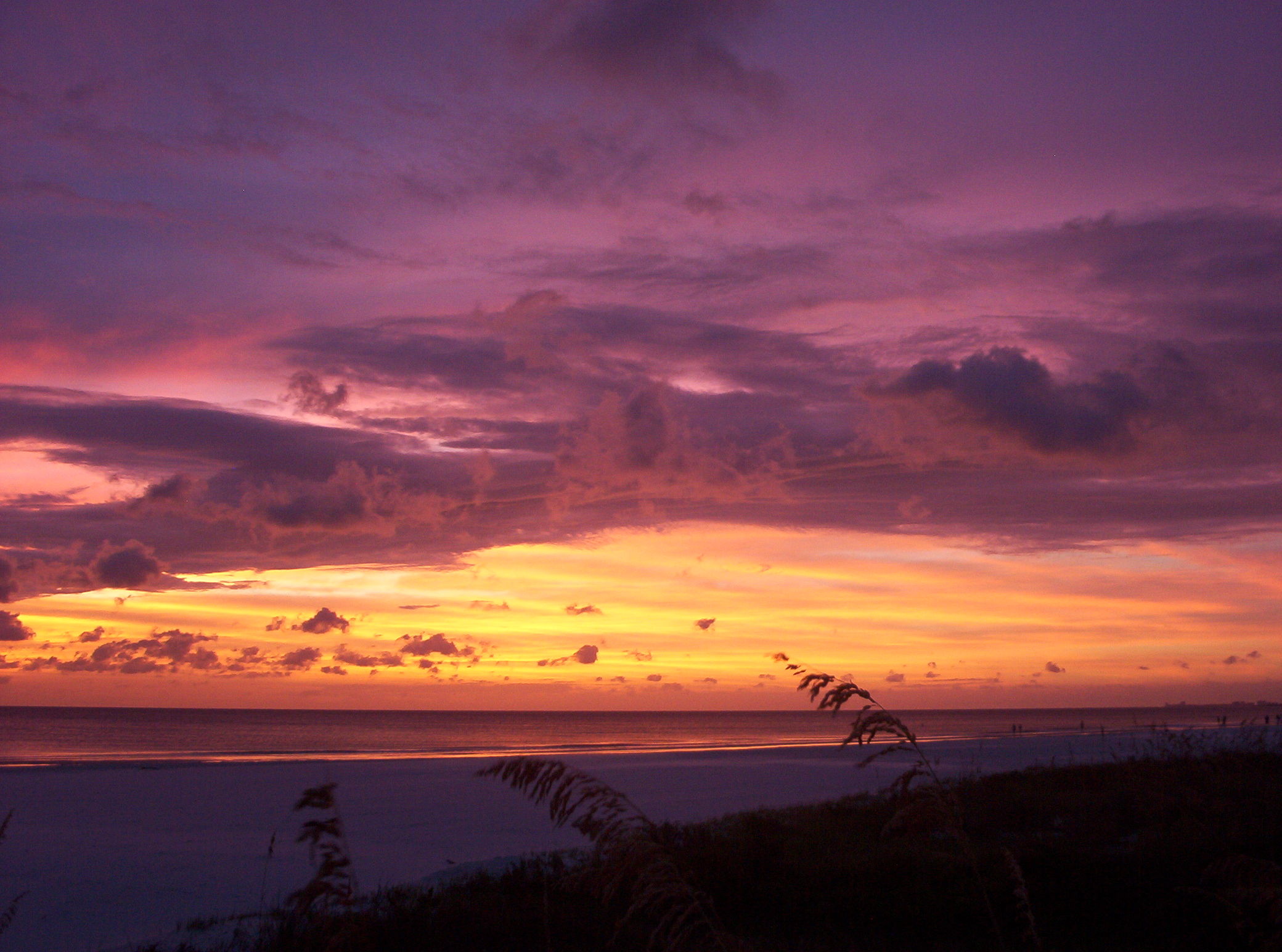 This is a sunset from St. Pete Beach at Hideaway Sands in September 2005. At this time there was a hurricane going through the Florida Keys. This was one of the most beautiful sunsets I have ever seen.